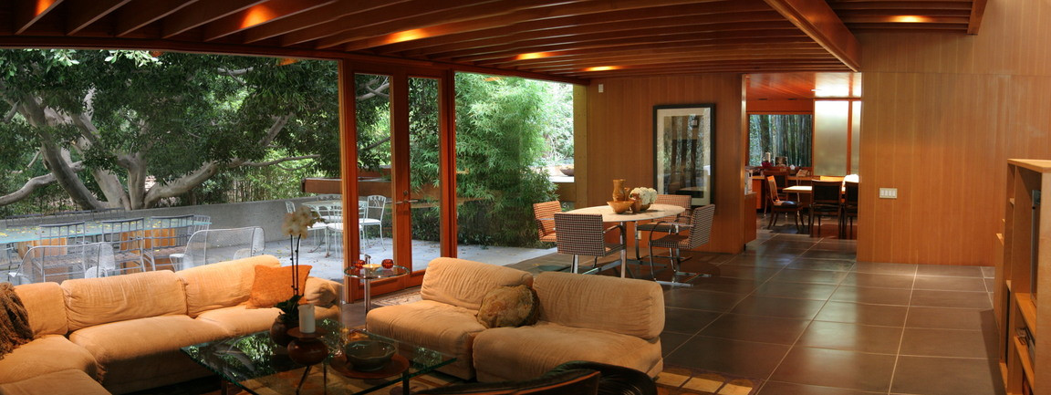 Open living and dining area with seamless indoor-outdoor flow at the Lautner estate