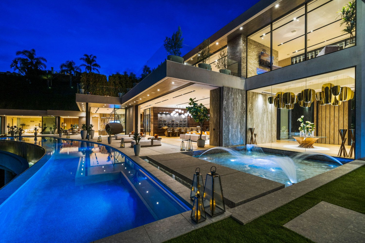 Infinity-edge pool with seamless indoor-outdoor entertaining spaces