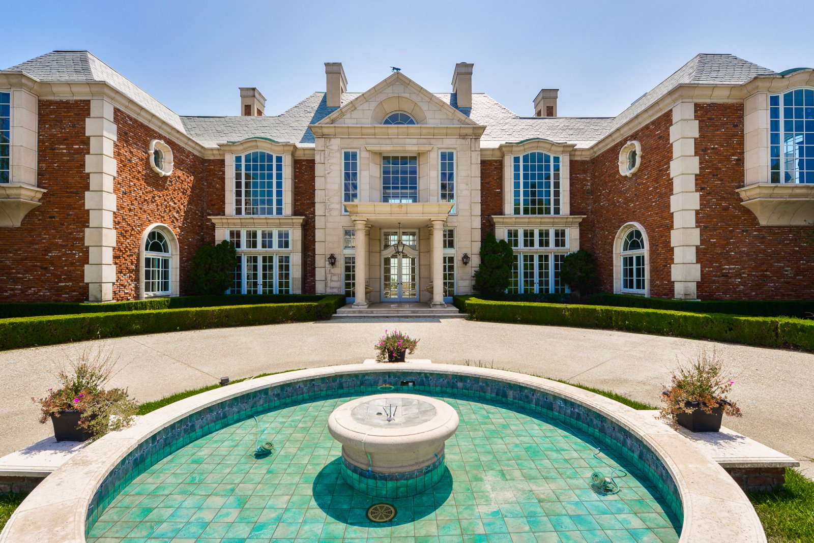Private Pasadena estate with an elegant circular driveway, fountain, and timeless architecture for weddings and special events.